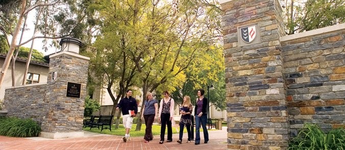 Students walking on campus at Drucker School of Management