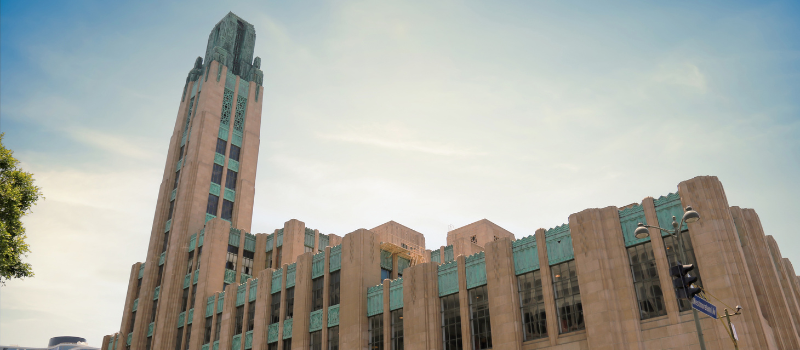 Bullocks Wilshire building against a blue sky