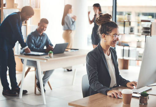 Woman at computer in office