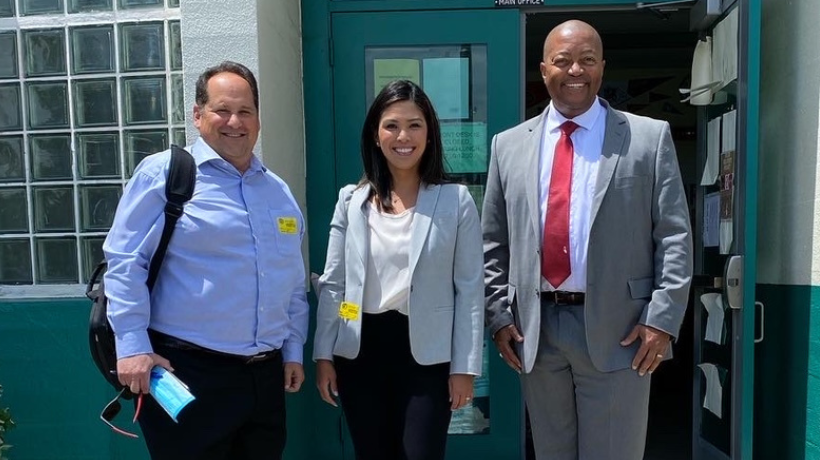 Attorney Volunteers Eric Blum and Nikki Fermin and Dorsey HS Instructor Donald Singleton