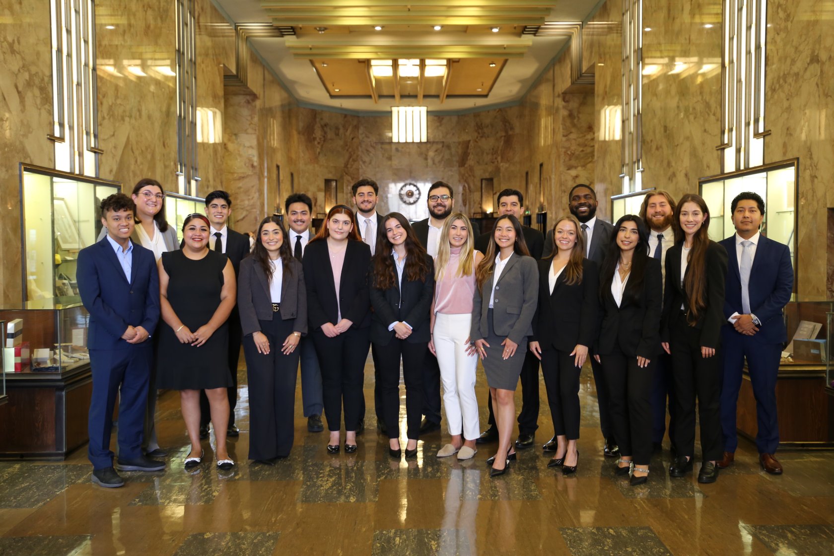 Law students in business professional suits in Bullocks Wilshire lobby